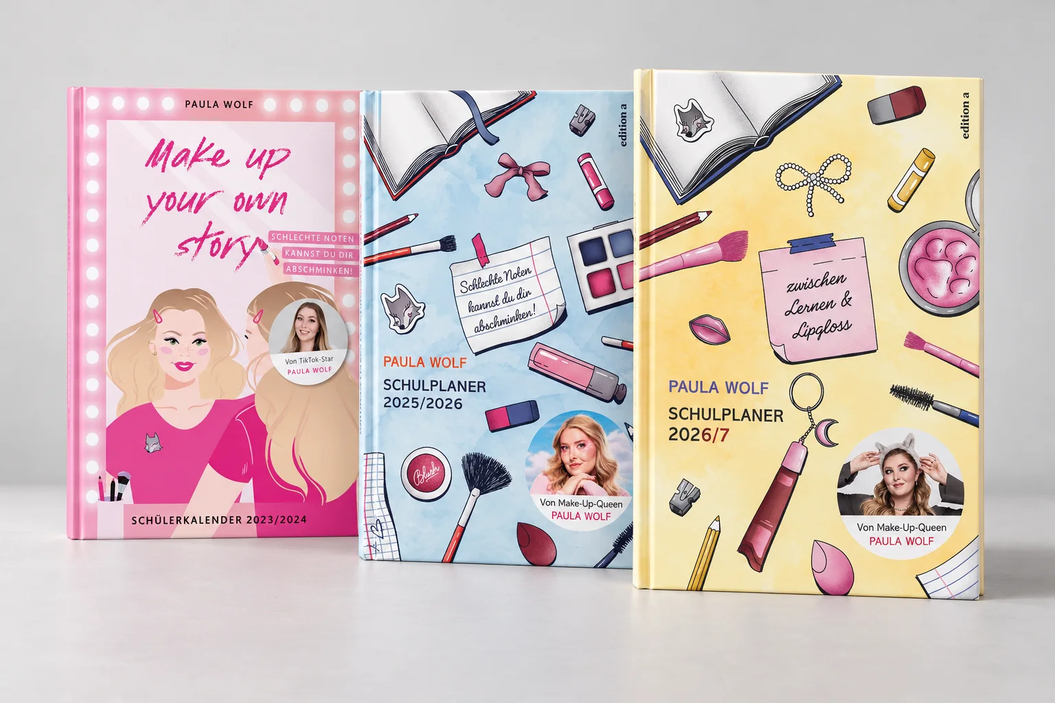 Drei Schulplaner von Paula Wolf: Schülerkalender 2023/24 in Pink, Schulplaner 2025/26 in Hellblau und Schulplaner 2026/27 in Gelb